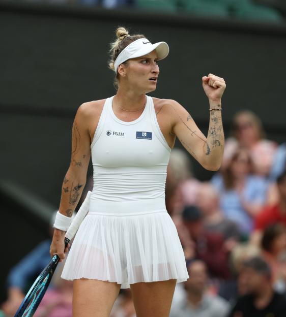 Marketa Vondrousova celebrates during a Wimbledon tennis match.