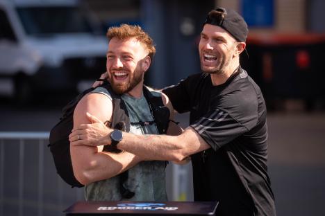 Joel Dommett surprises Sam Thompson at the start of his Soccer Aid challenge.