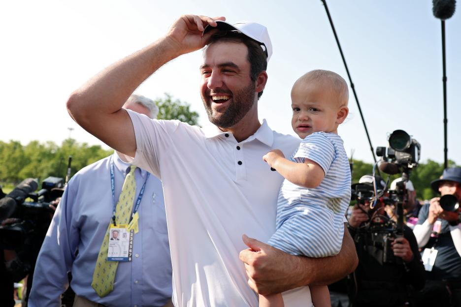 Scottie Scheffler celebrates his Memorial Tournament win with his son.