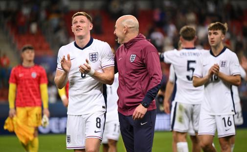 Elliot Anderson and Lee Carsley celebrating an England victory.