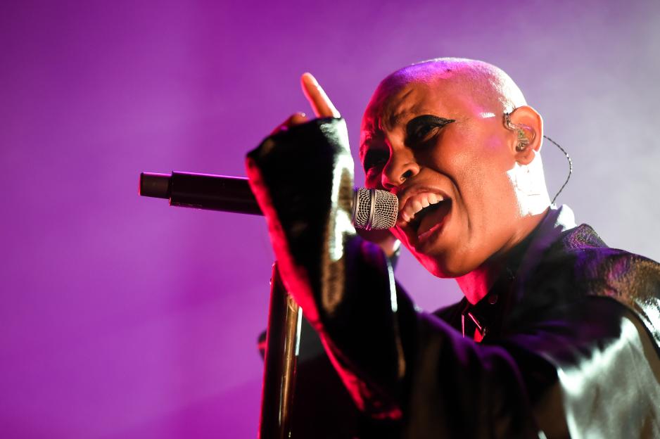 Skin, lead singer of Skunk Anansie, performing on stage.