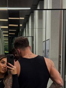 Photo of Awhina and Billy from Married At First Sight taking a selfie in a mirror.