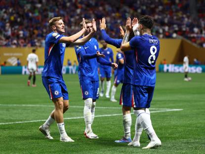Chelsea players celebrating a goal.