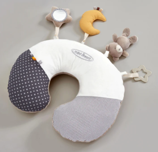 Recalled baby pillow with attached toys.