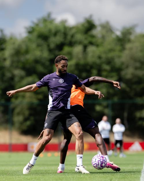 Matheus Cunha and Kobbie Mainoo of Manchester United in a training session.