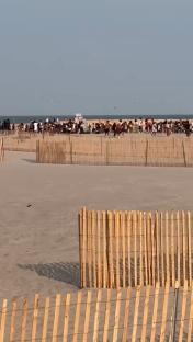 Beach brawl broken up by police helicopter.