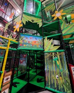 Jungle-themed indoor play structure.