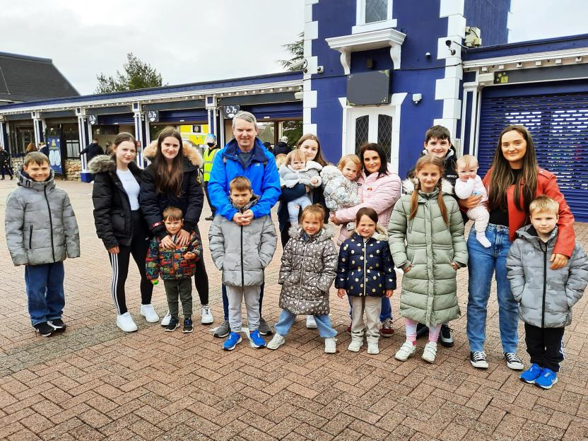 Large family posing for a photo.