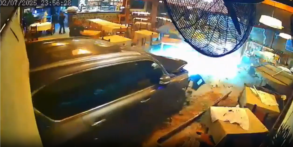 Car crashing into a restaurant.