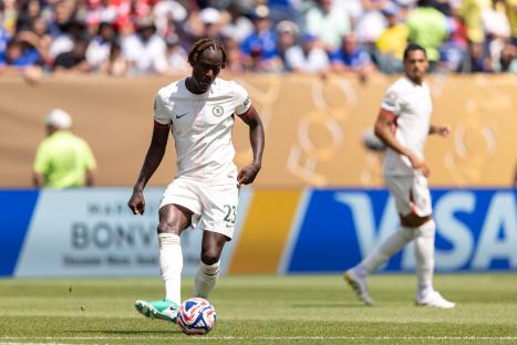 Trevoh Chalobah of Chelsea FC controls the ball during a soccer match.