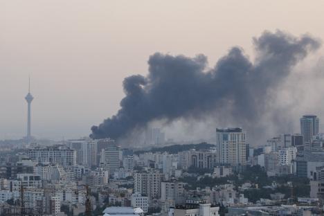 Smoke rises over Tehran following an Israeli attack.
