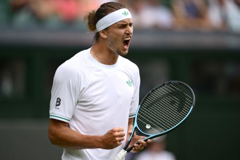 Alexander Zverev of Germany celebrates a point at Wimbledon.