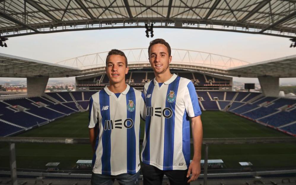 Diogo Jota and his brother AndrÃ© Silva at a stadium.