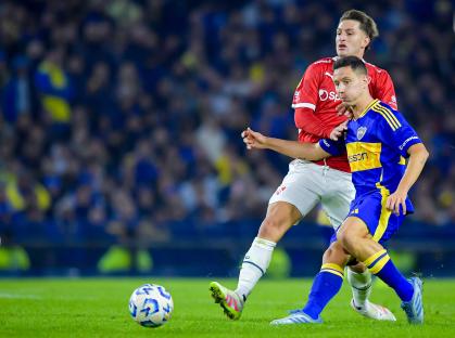 Soccer players vying for the ball.
