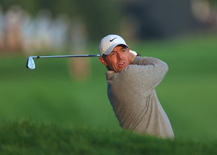 Rory McIlroy of Northern Ireland playing golf.