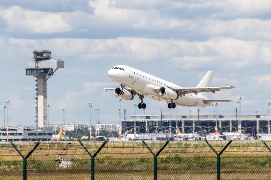 Airplane taking off from Berlin Brandenburg Airport.