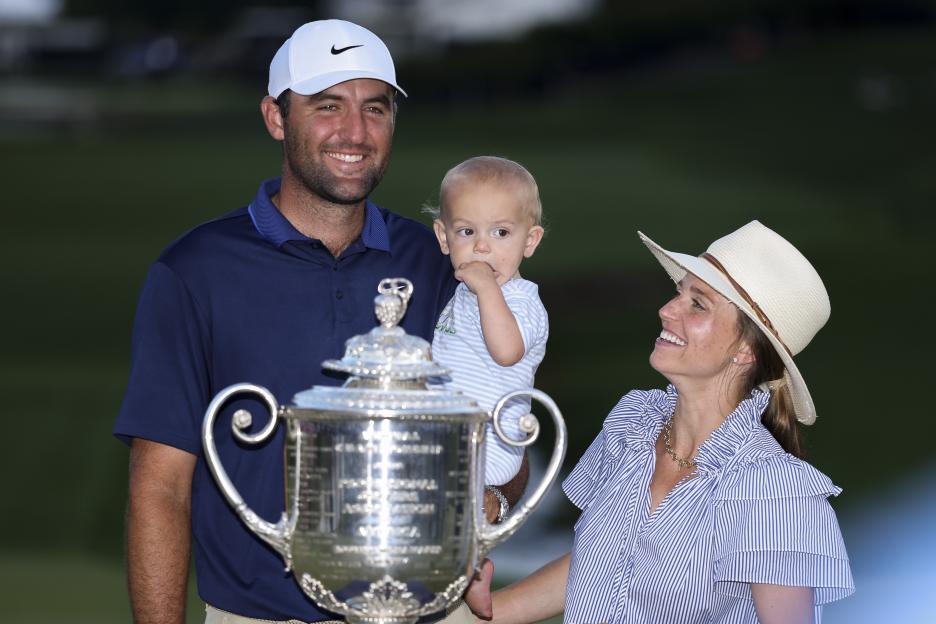 Scottie Scheffler with his family and the Wanamaker Trophy.