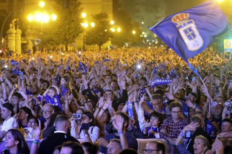 Real Oviedo fans celebrating their team's return to La Liga.