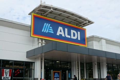 An image collage containing 1 images, Image 1 shows Exterior view of an Aldi store with customers entering and exiting