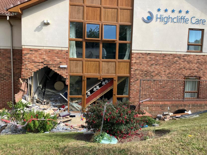 Car crashed into Highcliffe Care Home, causing significant damage.