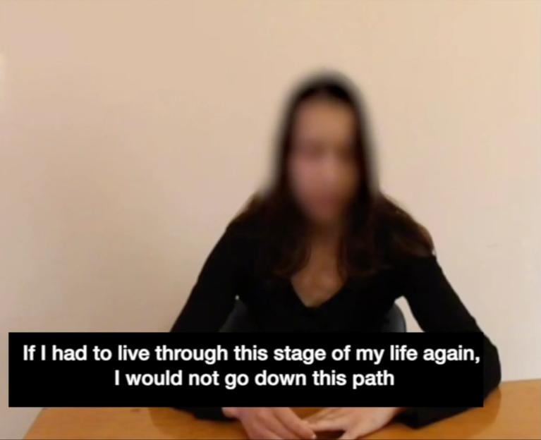 Blurred image of a woman stating,