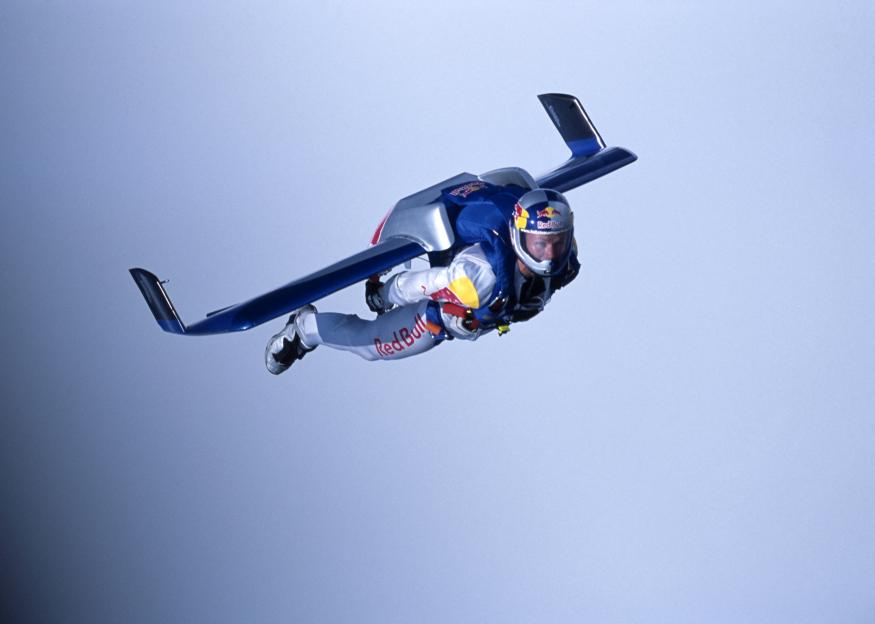 Skydiver in wingsuit during freefall.