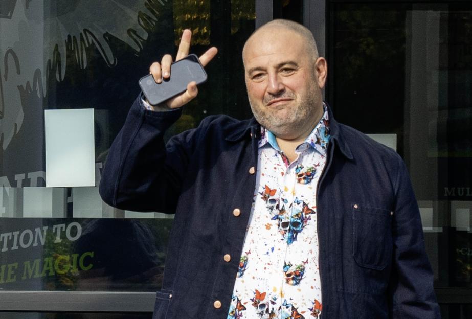 Wynne Evans giving a peace sign.