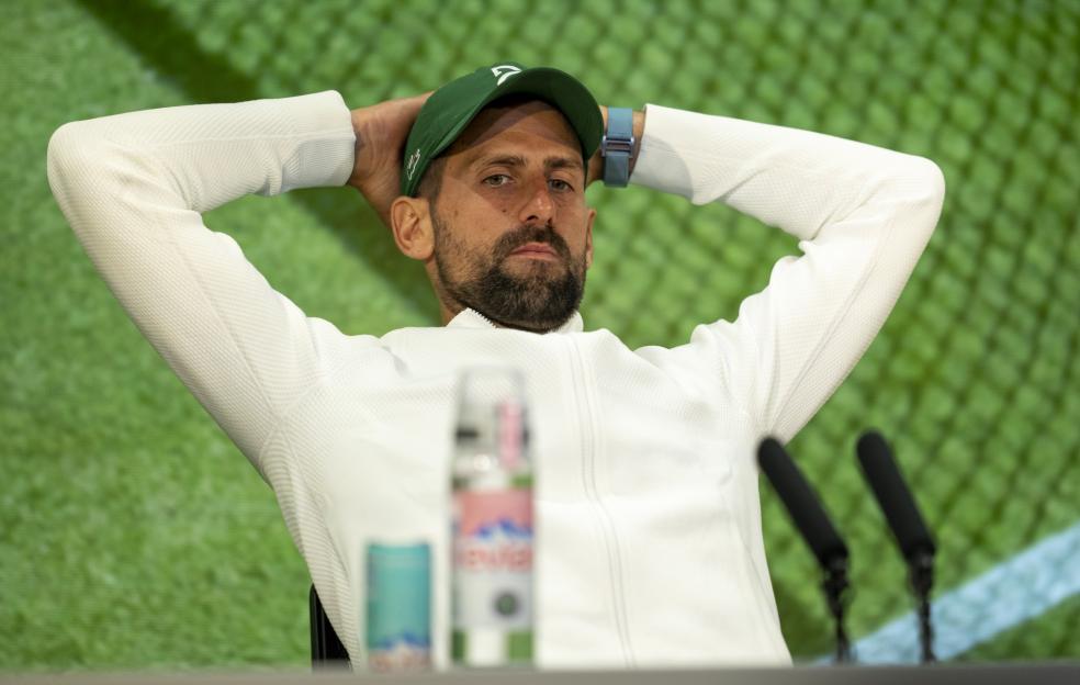 LONDON, ENGLAND - JULY 11: Novak Djokovic of Serbia speaks to the media, following his defeat against Jannik Sinner of Italy during the Gentlemen's Singles semi final match on day twelve of The Championships Wimbledon 2025 at All England Lawn Tennis and Croquet Club on July 11, 2025 in London, England. (Photo by Benjamin Gilbert - Pool/Getty Images)