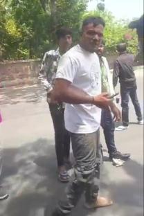Video still of Vishwash Kumar Ramesh walking away from a crash.
