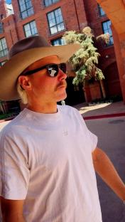 Valtteri Bottas wearing a cowboy hat and sunglasses.