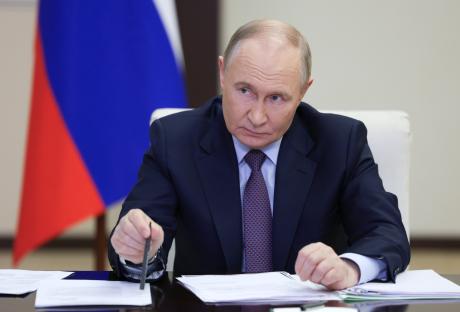 Vladimir Putin at a meeting.