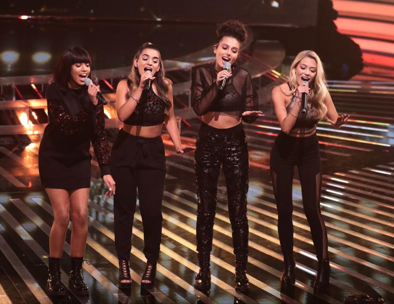 Four of Diamonds performing on stage.
