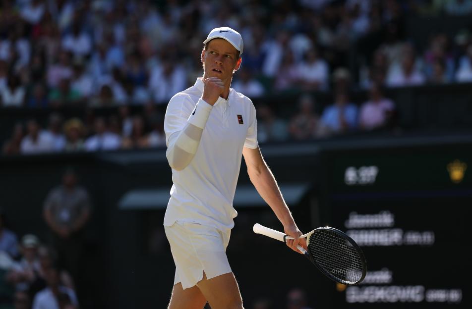Jannik Sinner of Italy celebrates a point at Wimbledon.