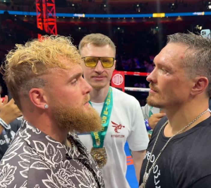 Two boxers facing each other.
