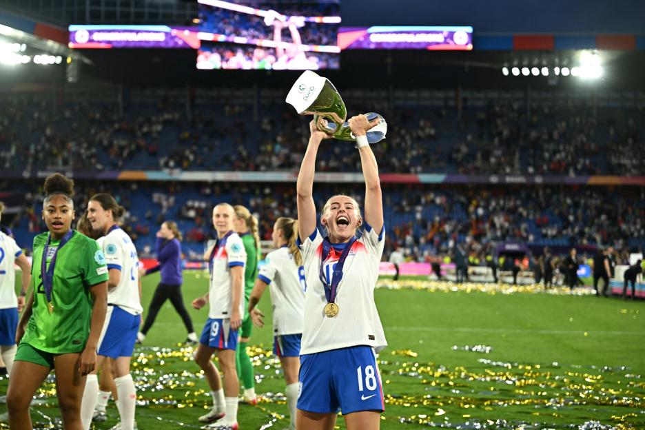 Chloe Kelly of England lifts the UEFA Women's Euro 2025 trophy.