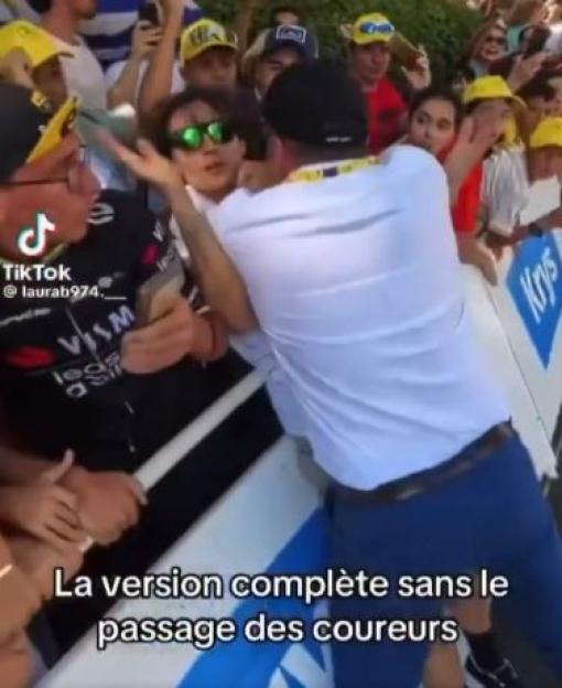 Security guard removing an anti-Israel protester at the Tour de France.