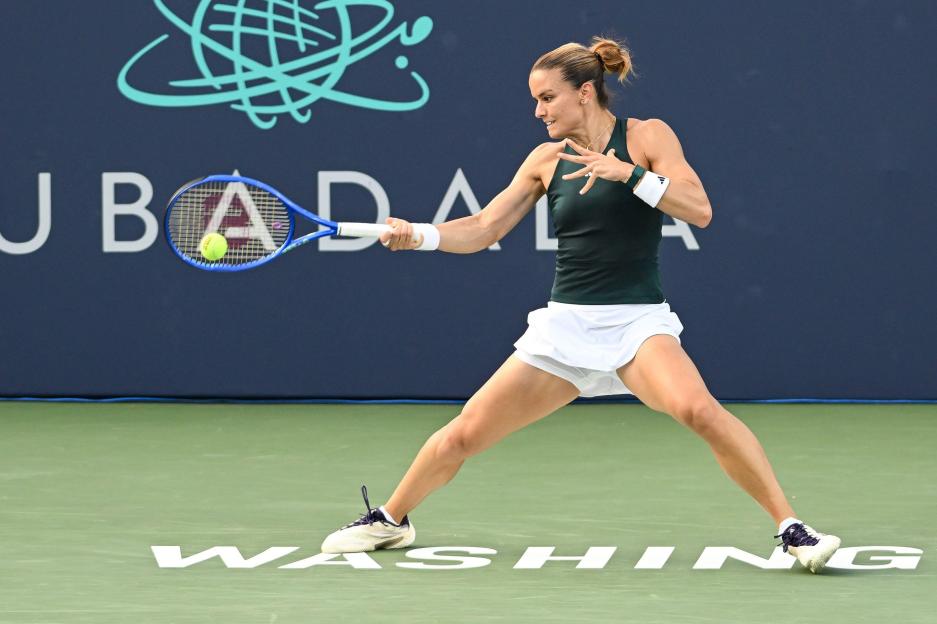 Maria Sakkari hitting a forehand during a tennis match.