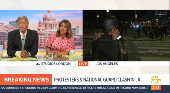 Screenshot of a news segment showing Richard Madeley with an injured arm, a female co-host, and a live report from Los Angeles showing a clash between protesters and the National Guard.