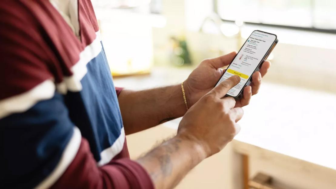 Person placing an Amazon order on their phone.