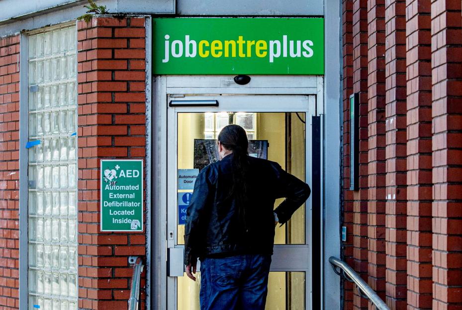 Person standing outside a Jobcentre Plus.