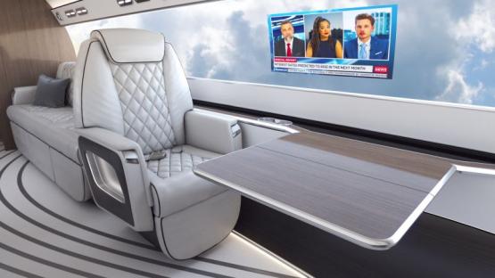 Illustration of the interior of the Otto Aviation Phantom 3500 jet, showing a passenger seat and a fold-down table.
