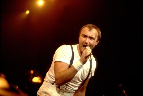 Phil Collins of Genesis performing onstage.