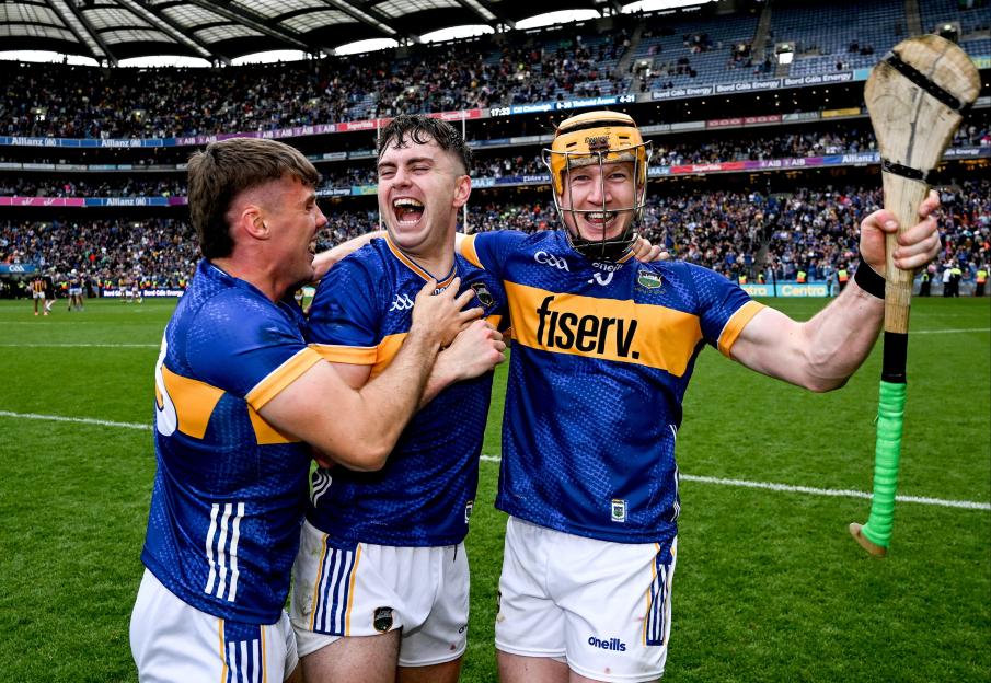 Tipperary hurlers celebrating after a GAA match.