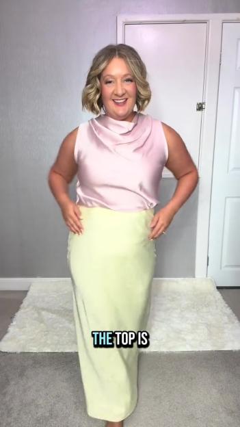 Woman modeling a pale pink sleeveless top and pale yellow midi skirt.