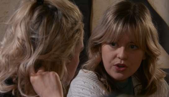 Screenshot of two women having a conversation.