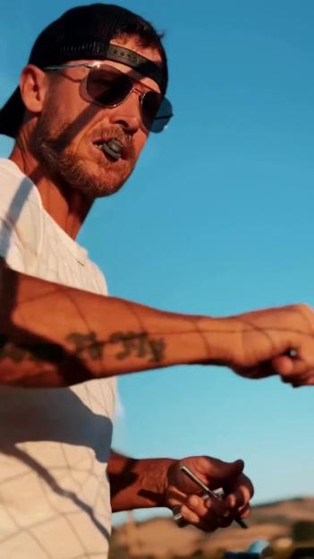 Photo of Felix Baumgartner preparing for a paragliding ride.