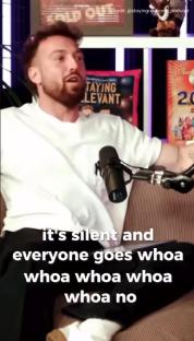 Sam Thompson on a podcast, speaking into a microphone.