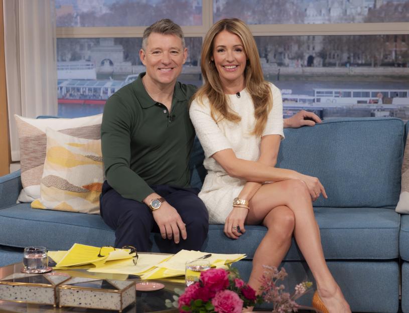 Ben Shephard and Cat Deeley on a TV show sofa.