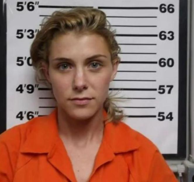 Mugshot of Rikki Lyn Laughlin in an orange jumpsuit.