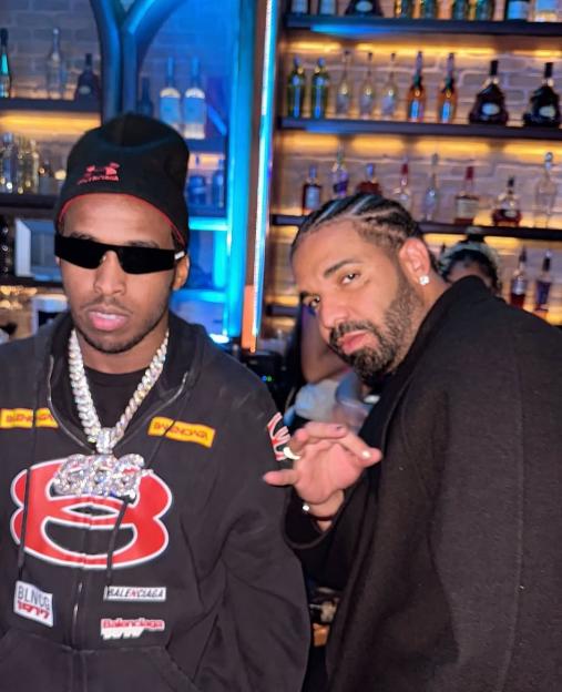 Drake and LMF's Top 5 together at a bar.